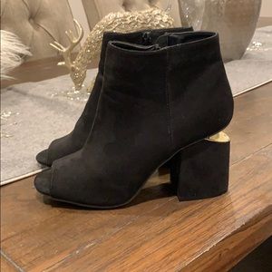 Black open toe booties.